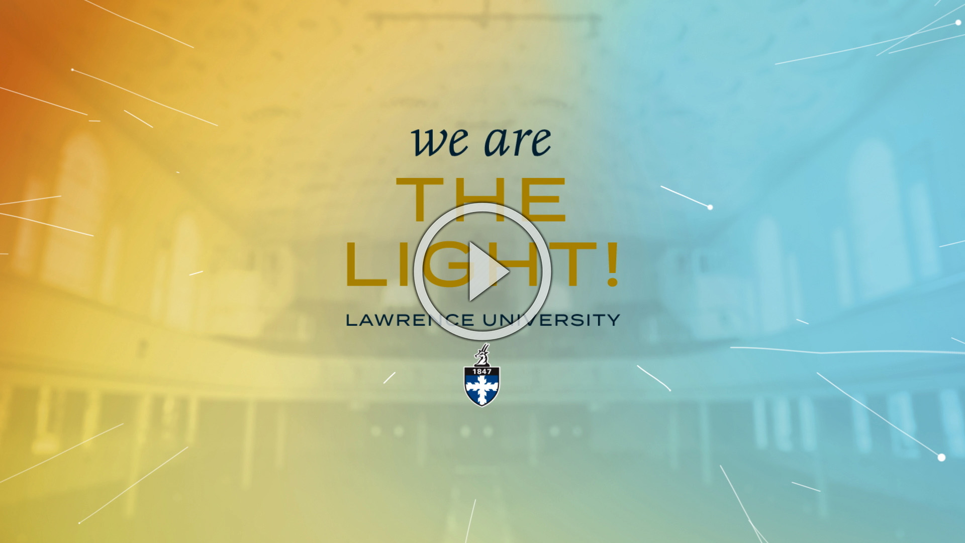 Memorial Chapel auditorium with a colorful gradient wash and text that reads, "We Are the Light! Lawrence University"